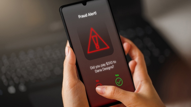 An image of a fraud detection alert on a mobile phone An image of a fraud detection alert on a mobile phone